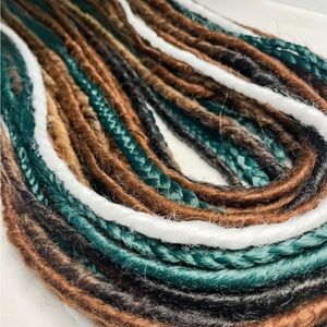 Synthetic dreadlock extensions by hippie cowgirl